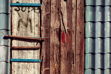 Combination of several parts of old building in single area of various textures. Forming an interesting combination of lines and patterns.の写真素材