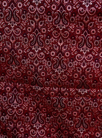 Fragment of colorful retro tapestry textile pattern with floral ornament useful as background. Indian styleの写真素材