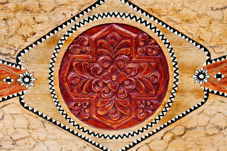 Pattern of wood frame carve flower on wood backgroundの写真素材