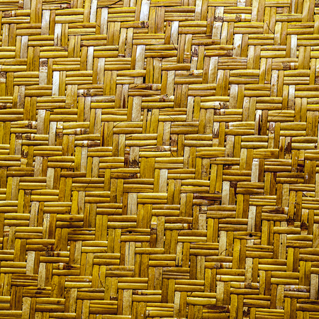 handcraft weave texture background natural yellow wickerの写真素材