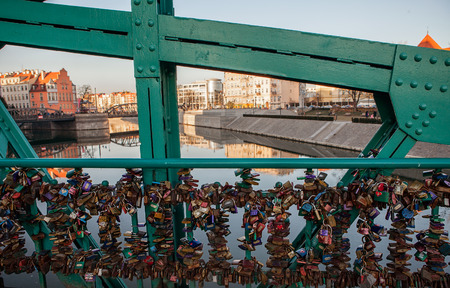 Love locks on Wroclaw bridge at sunny winter dayの写真素材