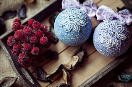 Christmas decoration on the wooden vintage background. New year greeting card template. Vintage effect. Scandinavian styleの写真素材