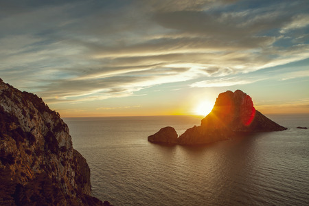 Seascape of sunset on Es Vedra island, Ibiza, Baleares, Spainの写真素材