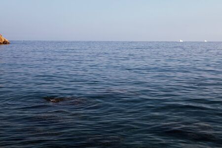 Blue sky and ocean in the dayの写真素材