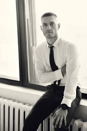 Fashion shot of a handsome young man in elegant classic suit. Mens beauty, fashionの写真素材