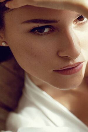 Beauty Model with Perfect Fresh Skin and Long Eyelashes. Youth and Skin Care Concept. Selected focus. - Imageの写真素材