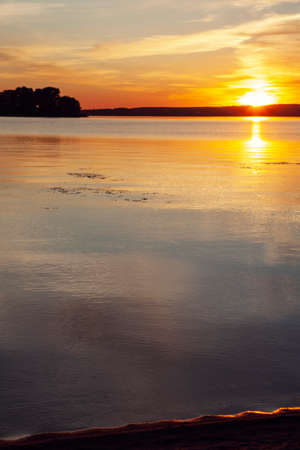 Sunset water horizon landscape. Sunset water scene. River sunset horizon view. Sunset water landscapeの写真素材