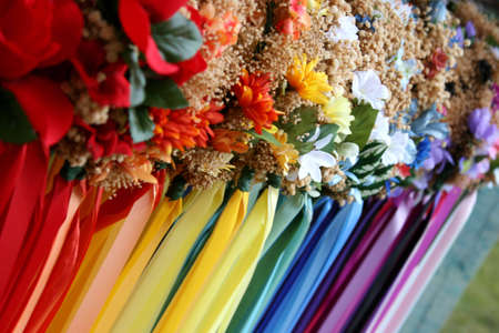 Ribbons line a wall at a spring festival の写真素材