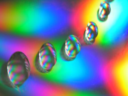           close up of water drops on compact disc の写真素材