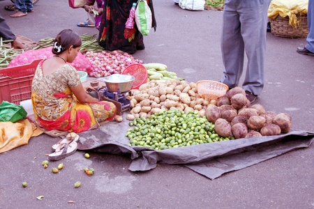 Hyderabad,AP,India-August 27,2011-Indian woman ,street vendor selling vegetables.のeditorial素材