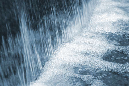 water flowing in a water fountainの写真素材