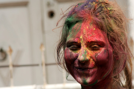 Hyderabad,India-March 6,2015:Hindu woman celebrating Holi, or festival of colors,annual Popular festival for Hindus and non-Hindus in most parts of the world.のeditorial素材