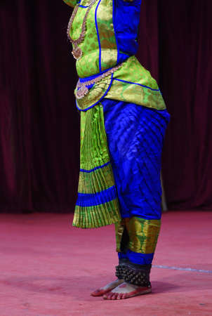 Indian woman perform traditional bharatanatyam danceの写真素材