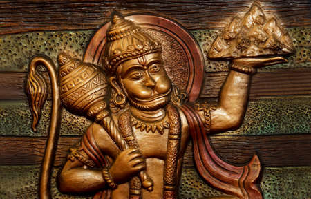 View of mural or wall art of Indian Hindu God Hanuman carrying Sanjivini hill as in mythology