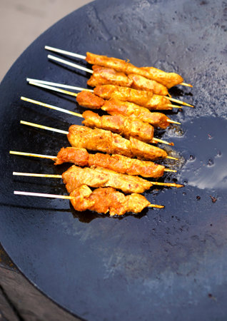 view of Indian street food making of kebabs