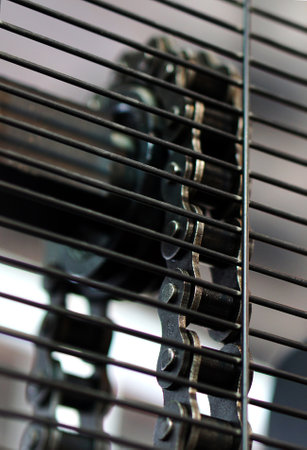 Close-up of chain system of material handling equipmentの写真素材