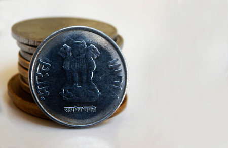 Close-up view of Indian money coins with three lions symbol and india word in english and national laguage Hindiの写真素材
