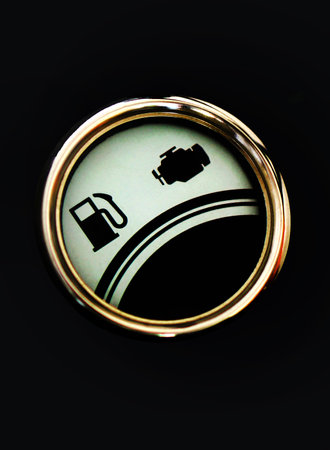 Close-up view of fuel gauge meter of a motor bike or two wheelerの写真素材