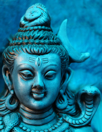 Close-up view of Indian Hindu God Shiva idol with snake hung on the neck as in mythology