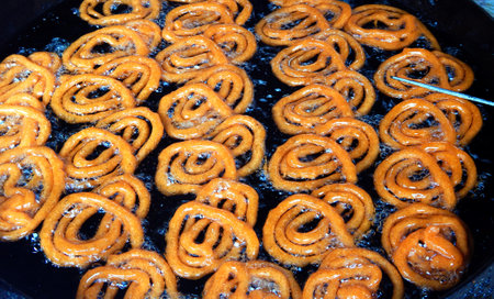 Close-up view of making Indian street food Jilebi, a popular sweet