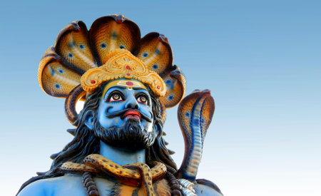 close-up view of Indian Hindu God Shiva Idol Against blue skyの写真素材