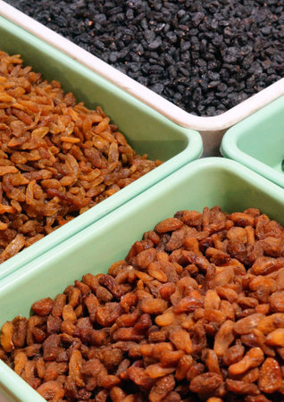 Close-up view of Indian dry fruits raisins in the marketの写真素材