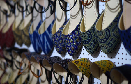 Close-up view Indian woman foot wear in shop display, in the marketの写真素材