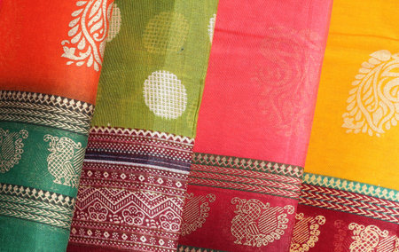 Close-up view of Indian woman fashion wear sarees or saris in retail display of a shopの写真素材