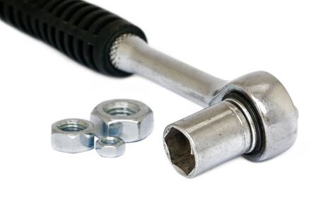 Isolated ratchet and nuts over white backgroundの写真素材