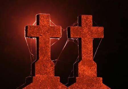 Two crosses in the cemetery at nightの写真素材