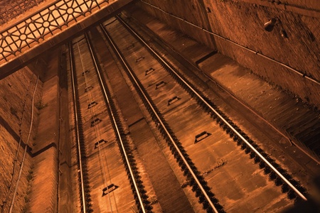 Abstract background of some rails in a tunnel