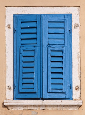 Old blue wooden window の写真素材