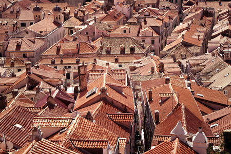 Lots of old red roof tiles - detail of the beautiful town in Dubrovnik, Croatiaの写真素材