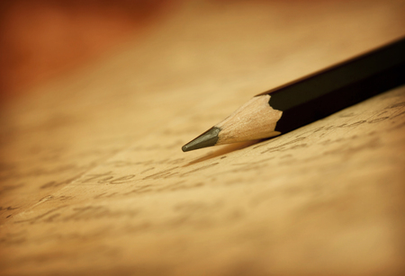 Pencil on old letter with handwritingの写真素材