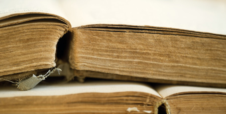 Old dusty books - wisdom, kowlidge conceptの写真素材