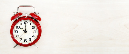 Time concept - website banner of a retro red alarm clockの写真素材