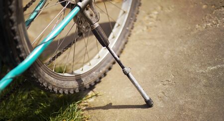 Web banner of an old bicycle as standing on the groundの写真素材