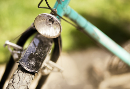 Biking concept - close-up of an old retro bicycleの写真素材