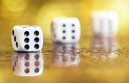 Businees success concept - winner six dice on golden backgroundの写真素材