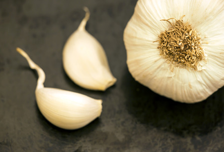 Fresh white garlic - healthy eating vegetable spice food, closeup, top-view