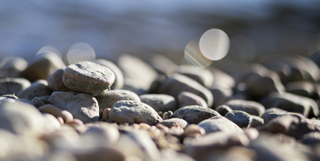 Web banner, background of grey pebbles on the beach, close-upの写真素材