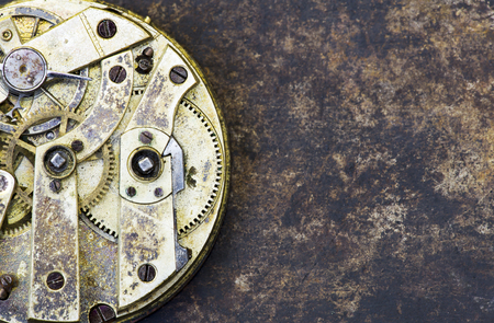 Gears of a vintage metal business clock watch close-up, time mechanism, grunge web banner with copy...