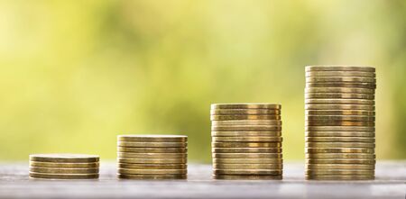 Pension retirement savings plan concept, web banner of money coins on green background