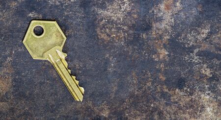 Solution, success golden key on grunge metal background, web banner with copy space