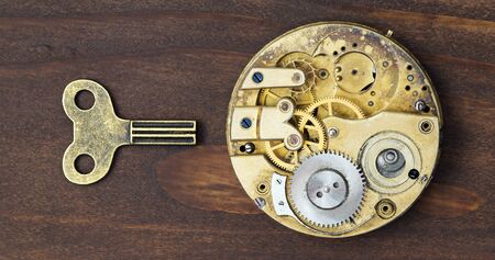 Business success and leadership concept, solution key with vintage watch gears mechanismの写真素材