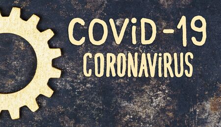 Coronavirus, covid-19 pandemic quarantine concept, shape symbol and text word on rusty metal background, bannerの写真素材