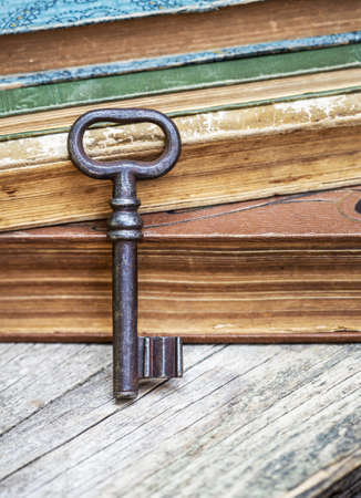 Vintage old key and antique books, escape room game conceptの写真素材