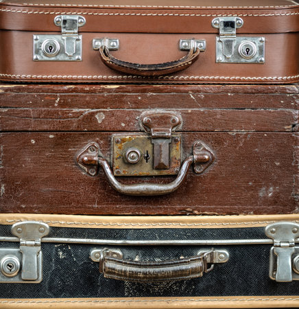 Set of old vintage retro suitcases. Travel, vacation or journey background.の写真素材