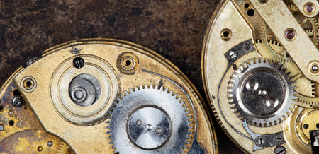 Gears of old vintage metal clock mechanisms. Time concept, banner or background idea.の写真素材