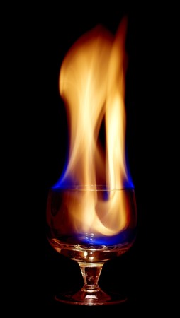Fire coctail on black, very hot drink. 